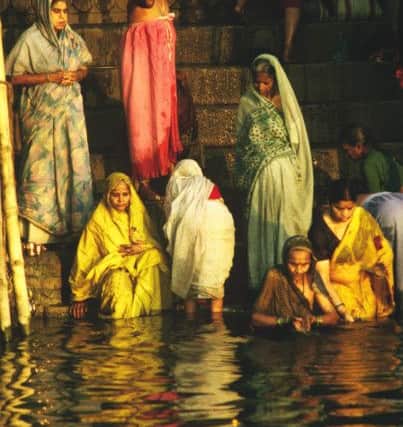 Women bathe in the Ganges at Varanasi (Picture: Trevor Fishlock)