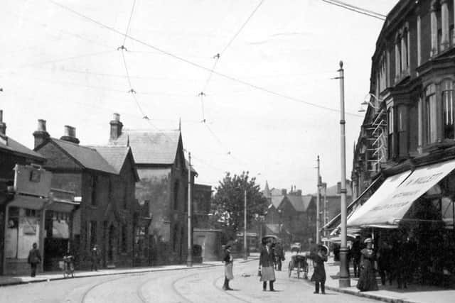 Looking west along Albert Road, Southsea, with the Kings Theatre behind the camera. Most of the buildings on the right remain.