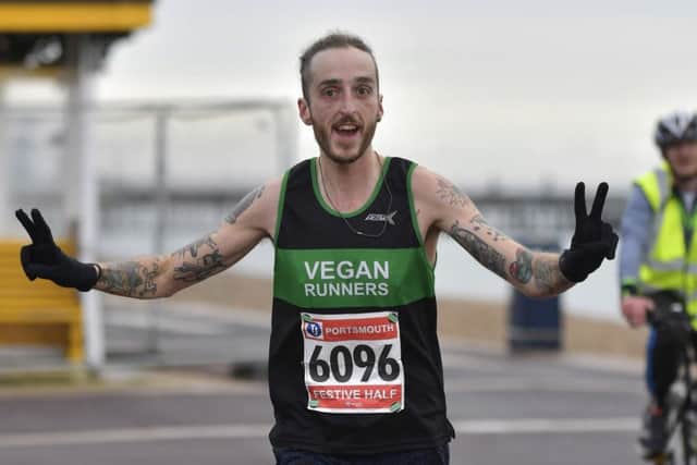 Jhon Cosgrove on his way to victory in the half marathon. Picture: Neil Marshall