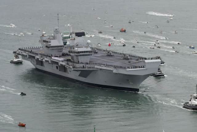 HMS Queen Elizabeth arriving in Portsmouth