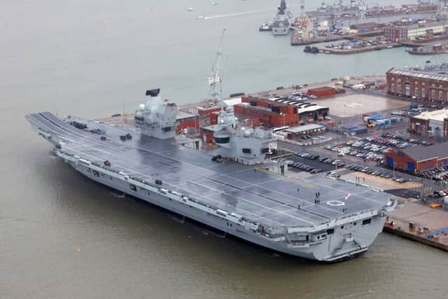 Pictured is the commissioning of HMS Queen Elizabeth at HMNB Portsmouth. Her Majesty the Queen formally commissioned her namesake aircraft carrier, HMS Queen Elizabeth into the Royal Navy fleet. Dec 7, 2017. PPP-170712-140559001