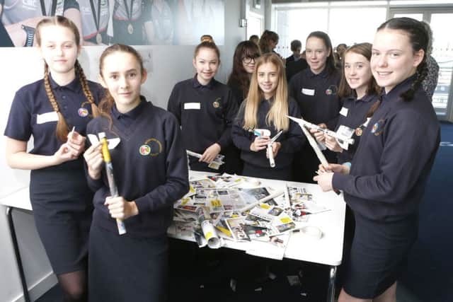 Pupils of Brookfield School making paper rockets