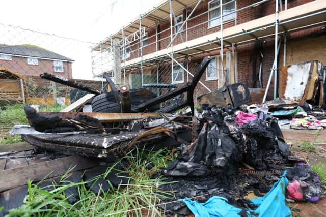 Some of the burnt remains next door to Angela's house