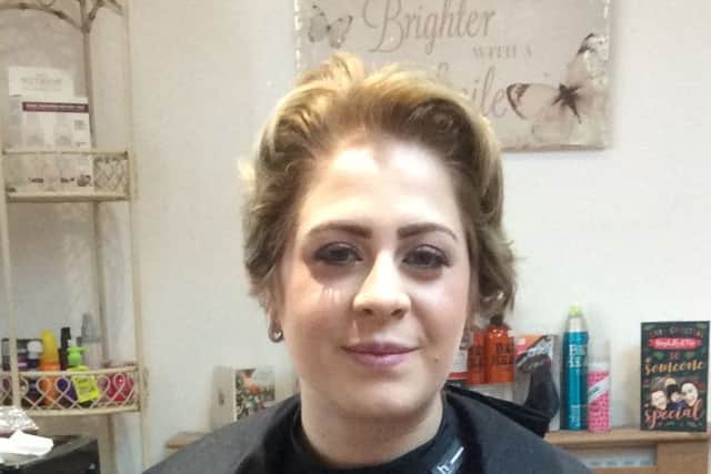 How Katie looked before the head shave