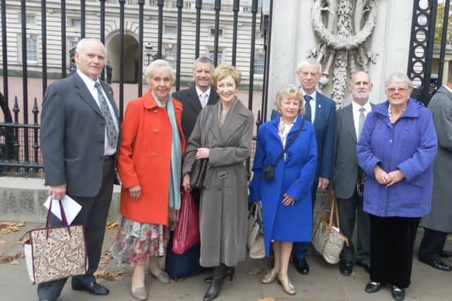 Pauline and Roger Wheeler from Fareham and Tony and Denise Driscoll from Portsmouth at Buckingham Palace