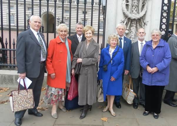 Pauline and Roger Wheeler from Fareham and Tony and Denise Driscoll from Portsmouth at Buckingham Palace