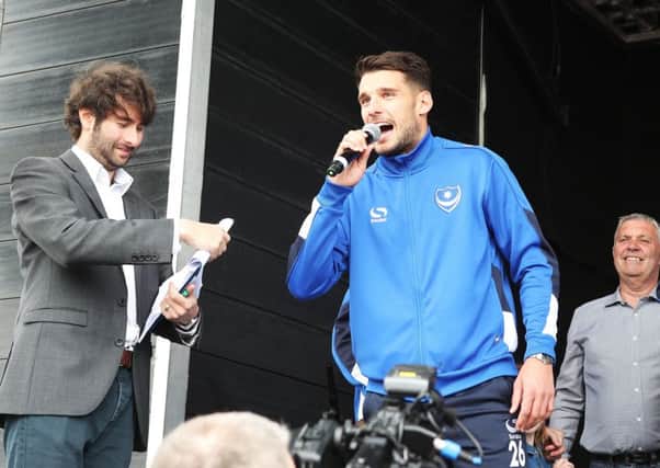 Gareth Evans addresses the crowd at Pompey's League Two title-winning celebrations on Southsea Common. Picture: Joe Pepler