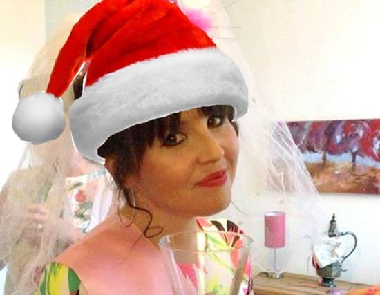 Where did she get that hat? Cheryl's organised and ready to party.