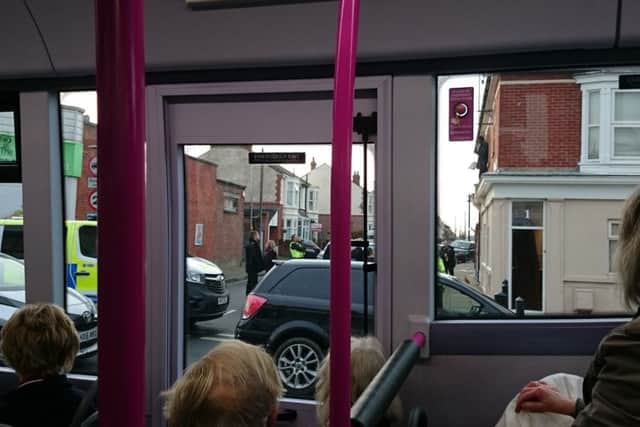 Police speaking to the man on the roof. Picture: Claire Ash