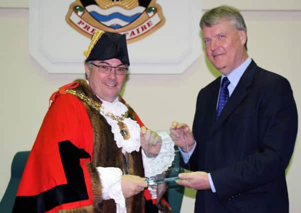 Councillor Woodward presenting the award to Mayor of Fareham Councillor Geoff Fazackarley