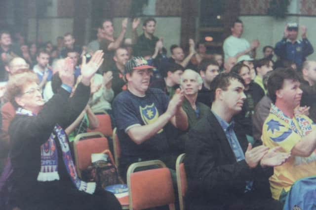 Fans at a crisis meeting backed moves to boycott Pompey's upcoming home game