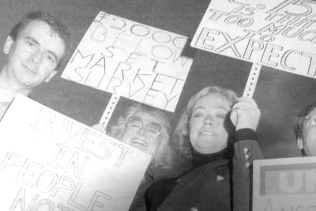 Paul Grantham, Jenny Sharp, Lynda Ryan and Colin Levine of the Southern Focus Trust demonstrate outside The New Theatre Royal