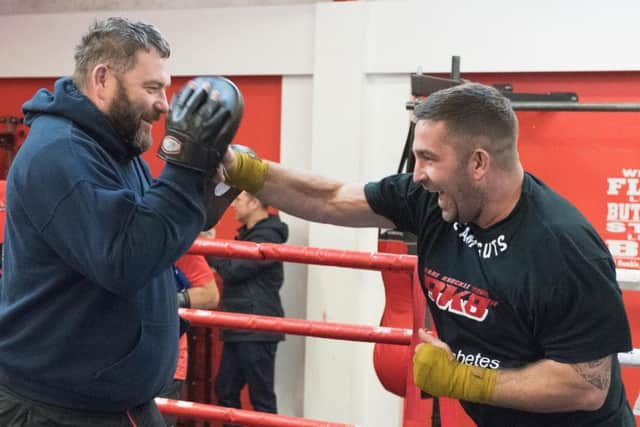 Mickey Parker on the pads with his boxing trainer Billy Bessey. Picture: Keith Woodland (171415-0127)