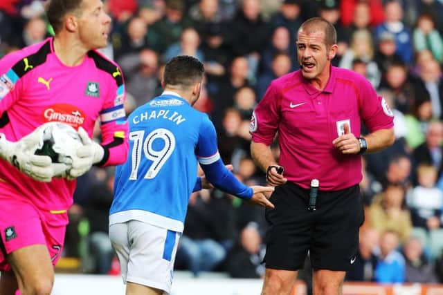Darren Handley speaks to Conor Chaplin during Pompey's 2-2 draw at Plymouth last term. Picture: Joe Pepler