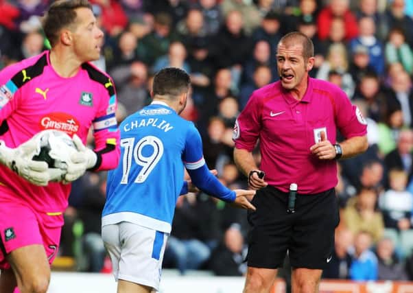 Darren Handley speaks to Conor Chaplin during Pompey's 2-2 draw at Plymouth last term. Picture: Joe Pepler