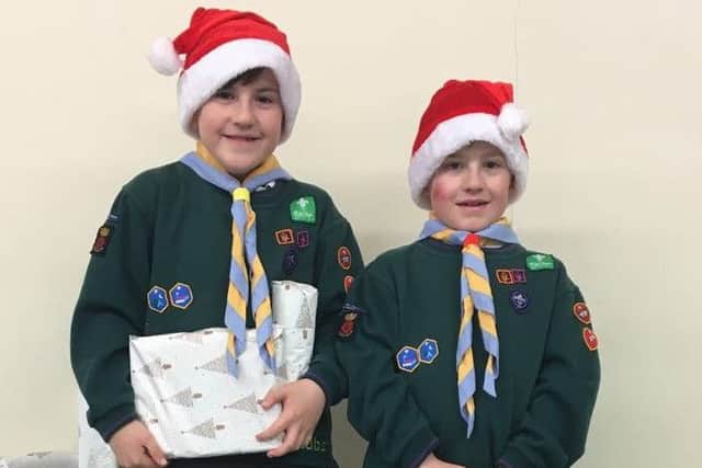 Seth and Joseph Newman, eight, part of the Sixth Gosport Scouts' Cubs troop. Picture: Lisa Young