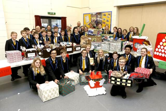 Teachers and pupils from Miltoncross with hampers ready to be given to the homeless Picture: Habibur Rahman