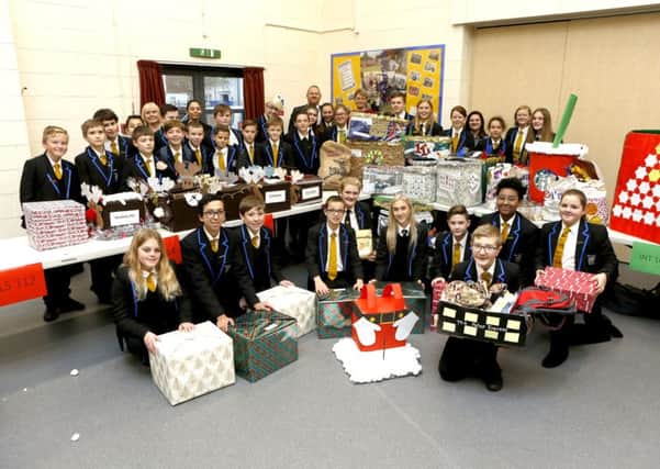 Teachers and pupils from Miltoncross with hampers ready to be given to the homeless Picture: Habibur Rahman