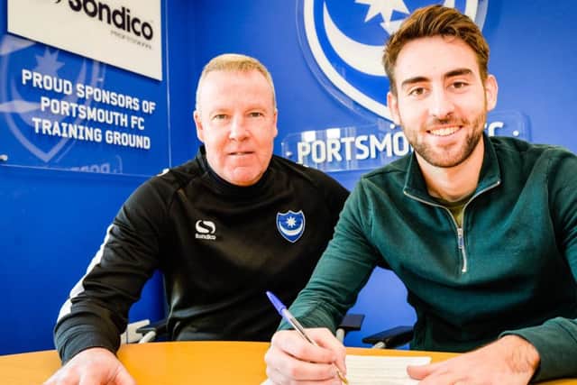 Ben Close pens a new contract at Pompey with Kenny Jackett. Picture: Colin Farmery