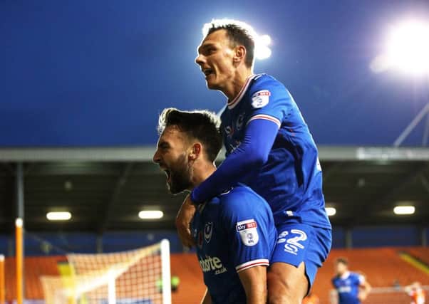 Ben Close celebrates his goal against Blackpool with Kal Naimsith. Picture: Joe Pepler