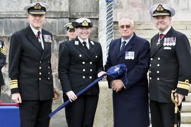 From left, the parade's guest of hnour Vice Admiral Duncan Potts CB, the director general Joint Force Development and Defence Academy, Midshipman Sarah Barrowclough, Captain Mike Croxford and Rear Admiral Simon Williams from the Britannia Association Picture: Craig Keating