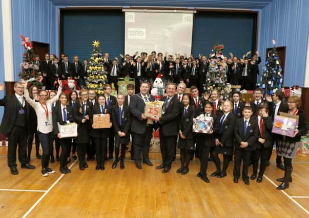 Pupils and teachers with Deputy Mayor Lee Mason with gifts for the homeless 
Picture: Habibur Rahman