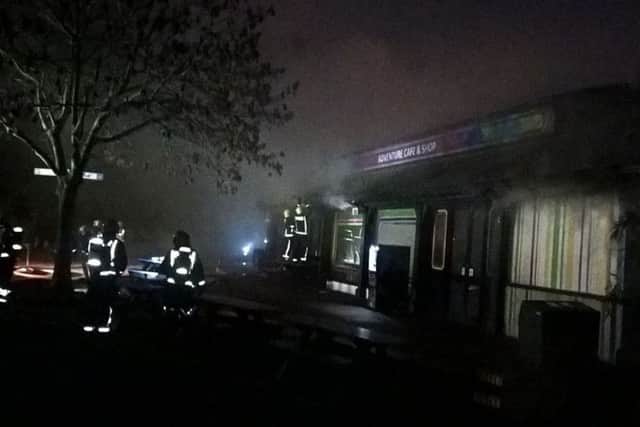 Smoke billows out of London Zoo's Adventure Cafe and Shop. Credit:  London Fire Brigade/PA Wire