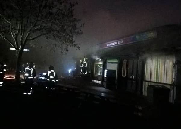 Smoke billows out of London Zoo's Adventure Cafe and Shop. Credit: London Fire Brigade/PA Wire