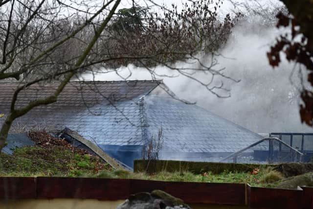 Smoke rises from the Adventure Cafe. Credit: Dominic Lipinski/PA Wire