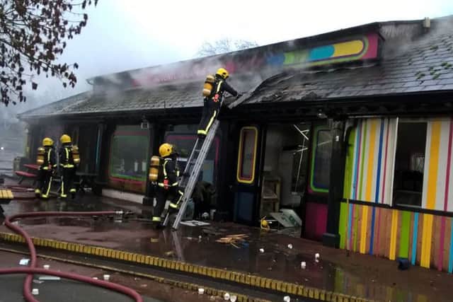 Firefighters working to put out the blaze at London Zoo's Adventure Cafe. Credit: London Fire Brigade/PA Wire