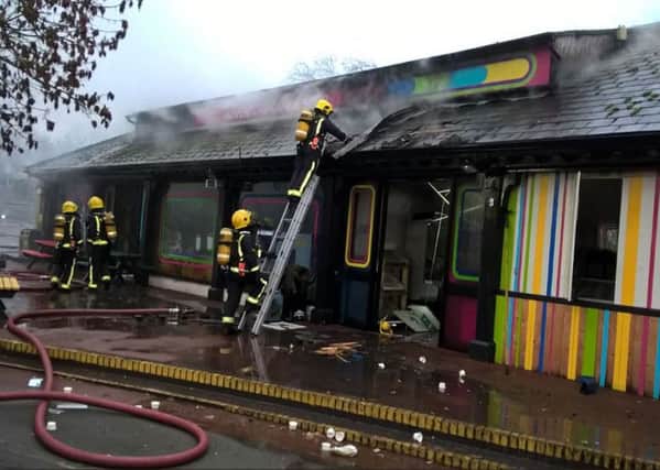 Firefighters working to put out the blaze at London Zoo's Adventure Cafe. Credit: London Fire Brigade/PA Wire
