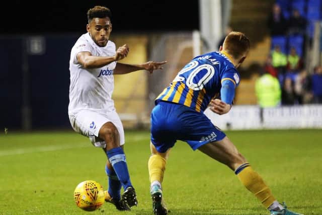 Pompey's Nathan Thompson competing against Shrewsbury. Picture: Joe Pepler