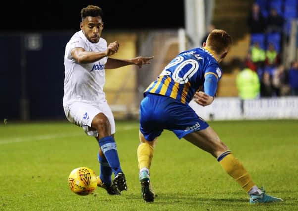 Pompey's Nathan Thompson competing against Shrewsbury. Picture: Joe Pepler