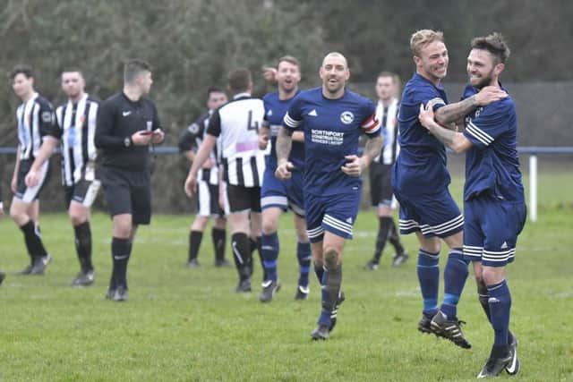 Alex Miroy celebrates his opening goal in Paulsgrove's 7-0 success over Hayling United. Picture: Neil Marshall (171728-15)