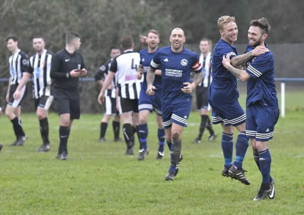 Alex Miroy celebrates his opening goal in Paulsgrove's 7-0 success over Hayling United. Picture: Neil Marshall (171728-15)