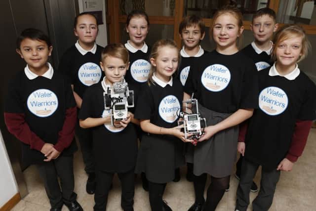 Meon Junior School with their robot Picture: Habibur Rahman (171665-092)