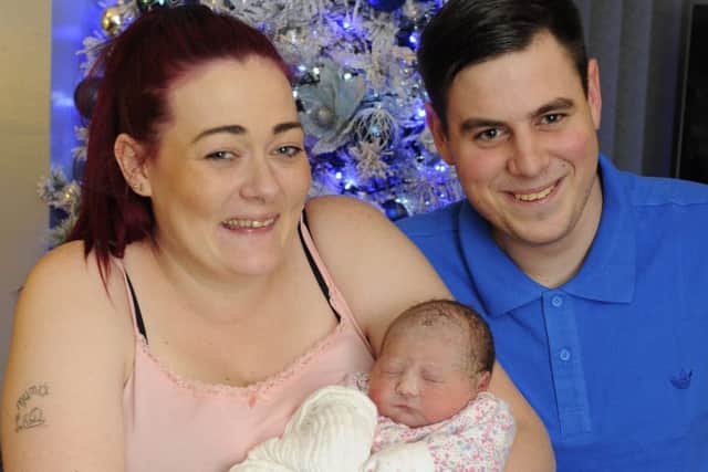 Krystal Kingdom and Ben Parr with baby Ava Kingdom Parr. Picture by Malcolm Wells