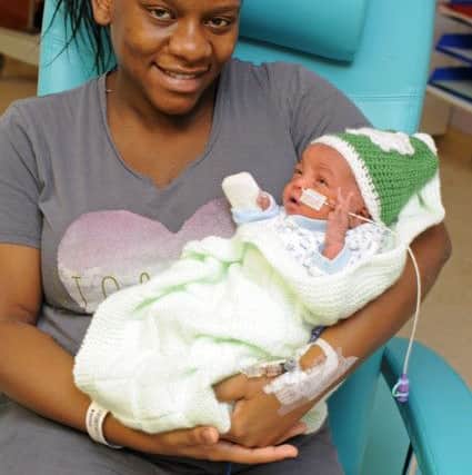 Katherine Wainaina with baby Justin Mwangi. Picture: Malcolm Wells