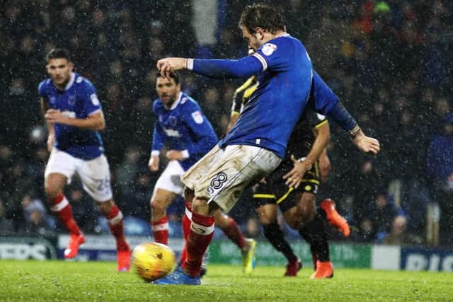 Brett Pitman nets the winner from the penalty spot. Picture: Joe Pepler