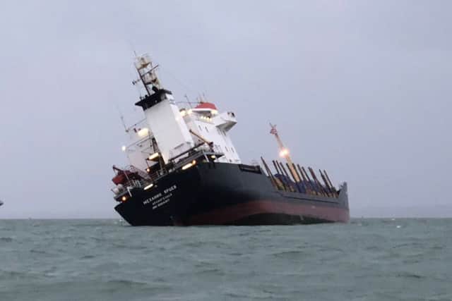 Handout photo of a Russian cargo ship listing near Portsmouth Harbour, which is being assisted by the Coastguard. PRESS ASSOCIATION Photo. Issue date: Tuesday December 26, 2017. See PA story SEA Coastguard. Photo credit should read: James Baggott/PA WireNOTE TO EDITORS: This handout photo may only be used in for editorial reporting purposes for the contemporaneous illustration of events, things or the people in the image or facts mentioned in the caption. Reuse of the picture may require further permission from the copyright holder. SEA_Coastguard_162041.JPG