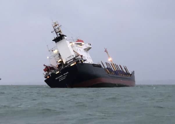 Handout photo of a Russian cargo ship listing near Portsmouth Harbour, which is being assisted by the Coastguard. PRESS ASSOCIATION Photo. Issue date: Tuesday December 26, 2017. See PA story SEA Coastguard. Photo credit should read: James Baggott/PA Wire

NOTE TO EDITORS: This handout photo may only be used in for editorial reporting purposes for the contemporaneous illustration of events, things or the people in the image or facts mentioned in the caption. Reuse of the picture may require further permission from the copyright holder. SEA_Coastguard_162041.JPG
