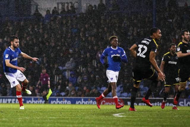 Ben Close took advantage of Jon Meades' error to give Pompey the lead against AFC Wimbledon. Picture: Joe Pepler