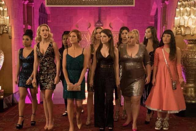 Chrissie Fit as Flo, Anna Camp as Aubrey, Ester Dean as Cynthia-Rose, Brittany Snow as Chloe, Kelley Jakle as Jessica, Anna Kendrick as Beca, Alexis Knapp as Stacie, Rebel Wilson as Fat Amy, Hailee Steinfeld as Emily and Hana Mae Lee as Lilly.