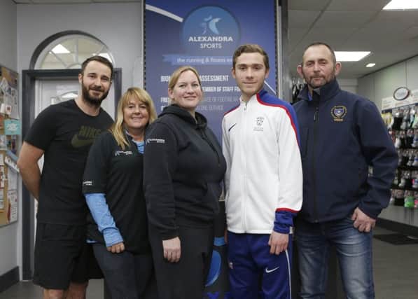 Lachlan Wellington with his trainer Vince Stamp and staff of Alexandra Sports, Sam Broad, Angie Mcleod and managing director of Alexandra Sports, Dawn Taylor. Picture: Habibur Rahman