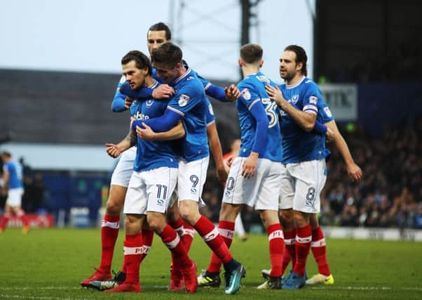 Pompey celebrate after equalising through a Matty Kennedy goal against Northampton. Picture: Joe Pepler/Digital South.