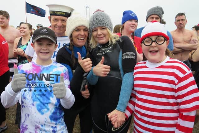 Danny Davies, Derek Peachey, Lisa Davies, Sharon Lewry and Madeline Lewry at the New Year's Day dip at Stokes Bay in Gosport
Pictures: Ben Fishwick