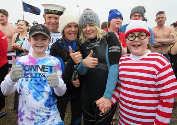 Danny Davies, Derek Peachey, Lisa Davies, Sharon Lewry and Madeline Lewry at the New Year's Day dip at Stokes Bay in Gosport
Pictures: Ben Fishwick