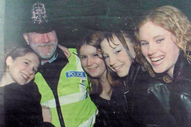 PC Andy Wright makes some new friends among the revellers enjoying a night out at Old Portsmouth