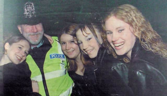 PC Andy Wright makes some new friends among the revellers enjoying a night out at Old Portsmouth