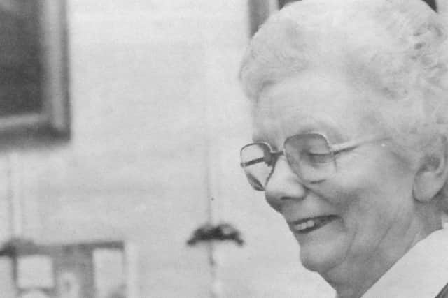 Shiela Langford reads the letter from Downing Street informing her of the MBE